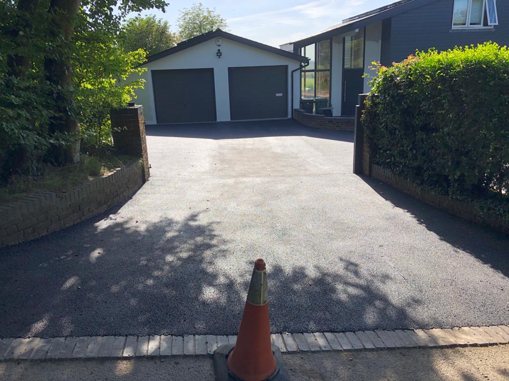 This is a photo of a bitumen driveway which is in the process of being installed by Barmera Road Tech SA